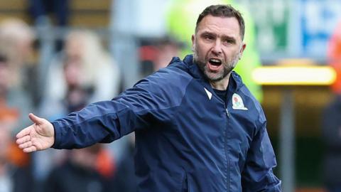 John Eustace makes a point from the sidelines while managing Blackburn