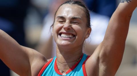 Aryna Sabalenka celebrates victory over Zheng Qinwen at the French Open