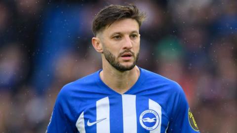 Adam Lallana playing for Brighton