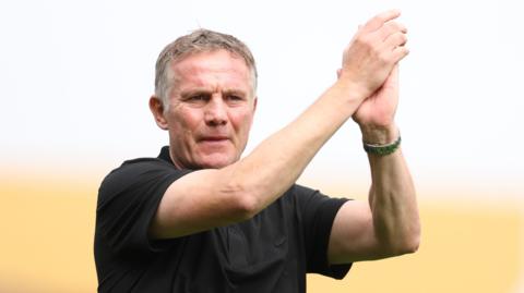 Wrexham manager Phil Parkinson applauds