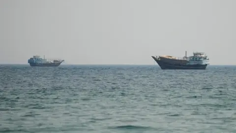 Vessels at the Strait of Hormuz, as seen from Musandam,Oman, July 12, 2026.