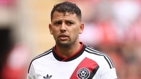 Gus Hamer playing at Rotherham in a pre-season friendly in Sheffield United's new away kit