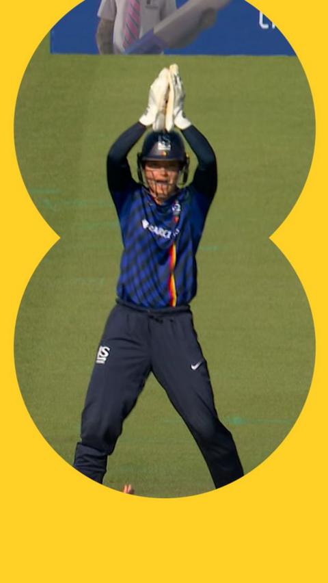 Amy Jones after taking a catch 