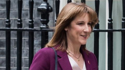 Rachel Reeves looks stern as she walks past raillings outside Downing Street on Tuesday
