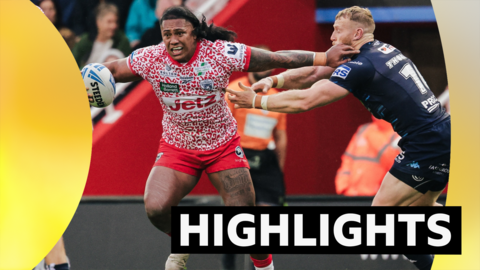 Tesi Niu of Leigh is tackled by Luke Thompson of Wigan