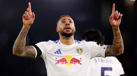 Lukas Nmecha of Leeds United celebrates scoring his team's first goal