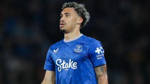 Roman Dixon looks on, wearing a blue shirt, while playing for Everton against Doncaster Rovers on 27 August 2024