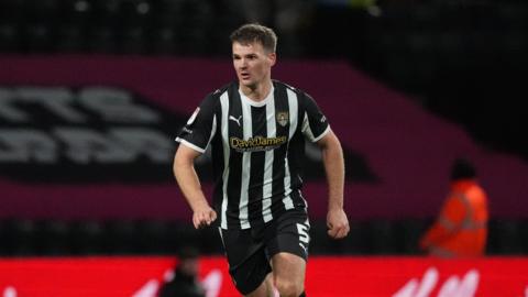 Matt Platty dribbling with the ball