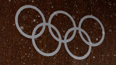 The Olympic rings in the snow in Milan