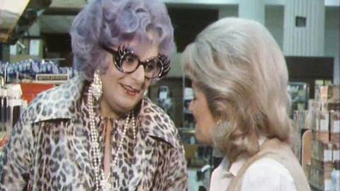 Dame Edna talking to Jean Rook.