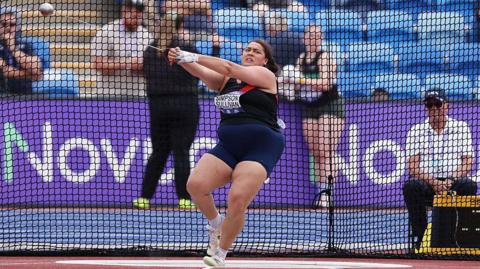 Tara Simpson-Sullivan spins in the circle ahead of releasing the hammer at the UK Championships last month
