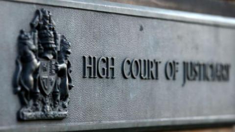 Sign outside the High Court in Edinburgh which says 