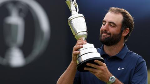 Scottie Scheffler with the Claret Jug after winning the 2025 Open Championship