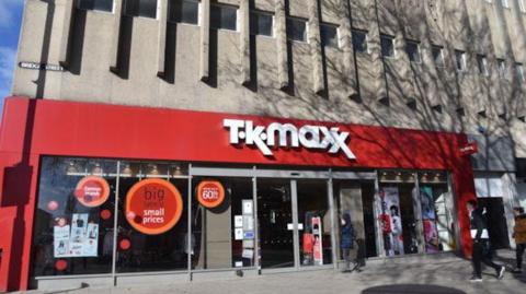 The front of the building when it was a TK Maxx, with the red and white signage on the front.
