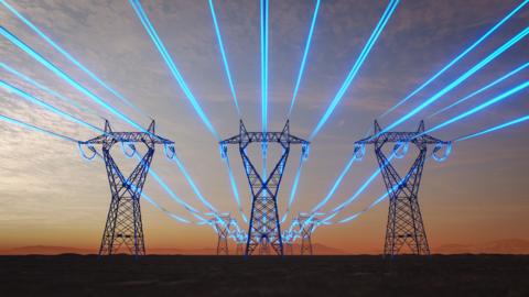 Pylons with powerlines of blue light