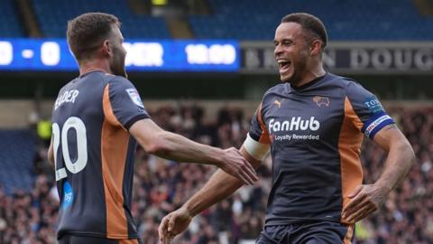 Derby County's Carlton Morris (centre) celebrates scoring 
