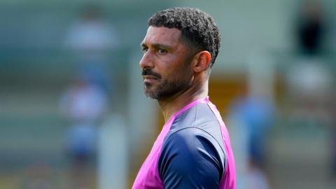 Newport County boss Hayden Mullins in the dugout against Yeovil