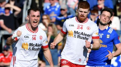 Darragh Canavan celebrates a point for Tyrone