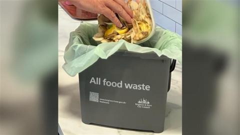 A small grey bin which says "all food waste" on the side along with the Brighton and Hove City Council logo.