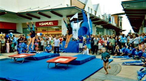 Young girls are pictured trampolining as part of Westwood Cross's official opening on 9 June, 2005.
