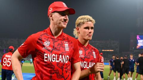 Harry Brook and Jacob Bethell leave the field after the T20 World Cup match between England and Bangladesh