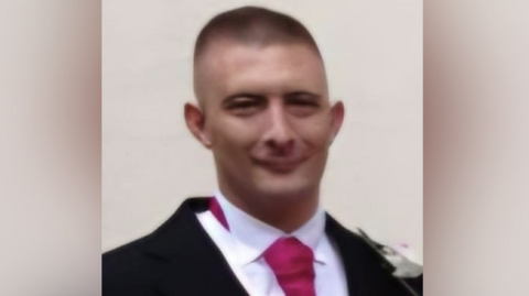 Ashley Menzel in a wedding suit