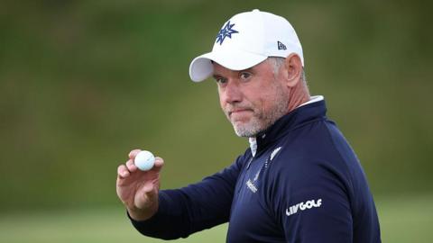 Lee Westwood acknowledges the crowd on the 18th green