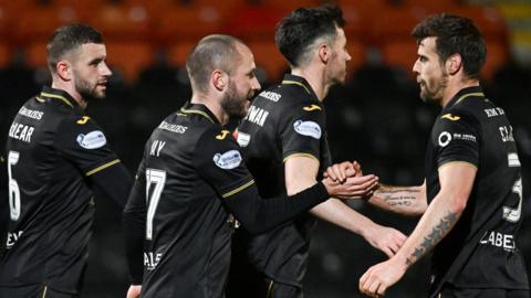 Livingston players celebrating