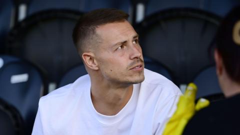 Billy Bodin sat in the stand