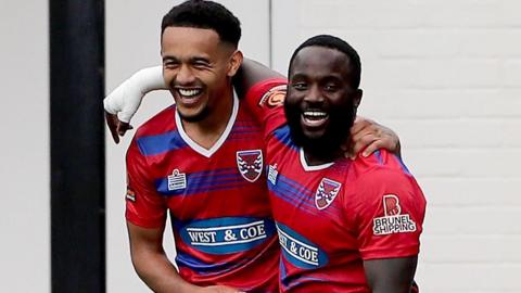 Dion Pereira celebrates for Dagenham