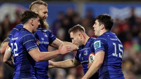 Leinster players celebrate Jordan Larmour's score