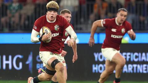Henry Pollock playing for the Lions