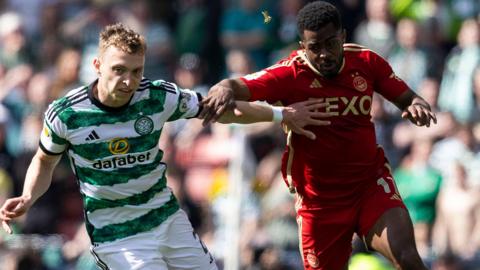 Celtic's Alistair Johnston and Aberdeen's Luis Henriques de Barros Lopes during a Scottish Gas Scottish Cup semi-final match between Aberdeen and Celtic at Hampden Park, 