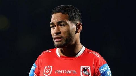 Mat Feagai standing on the pitch during a match for St George Illawarra Dragons