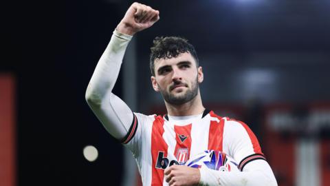 Tom Cannon celebrates scoring four goals for Stoke against Portsmouth