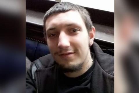 A photo of Joshua Wilson, who has short dark hair with a dark goatee beard.