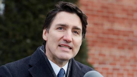 Canada's Prime Minister Justin Trudeau speaks to reporters, announcing he intends to step down as Liberal Party leader