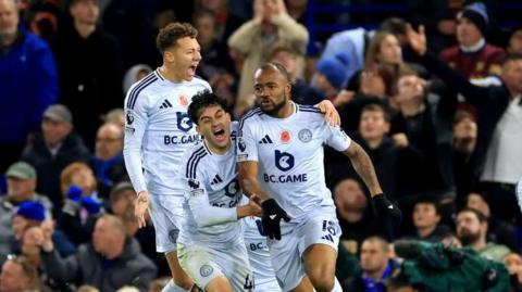 Jordan Ayew celebrates scoring late for Leicester City against Ipswich Town