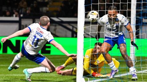 St Johnstone's Sam Stanton's shot is cleared off the line by team mate Josh Fowler