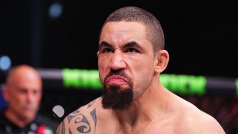 Robert Whittaker in action against Khamzat Chimaev in October