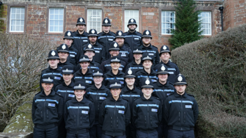 Rows of recruits in front of the force headquarters 