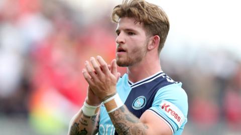 Jasper Pattenden applauds Wycombe's supporters