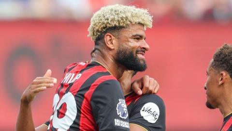 Bournemouth's Philip Billing is congratulated by a team-mate after scoring the first goal in his side's 3-0 win against Everton at the MetLife Stadium