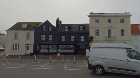 Parking spaces outside outside China Red on St George's Esplanade