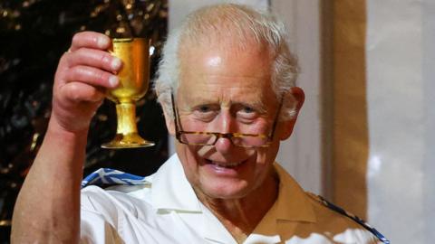 King Charles raises a glass in a toast at the Commonwealth summit in Samoa