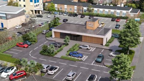 A GCI image of a Starbucks drive-thru with a car park in front