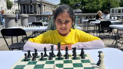 Bodhana playing chess.