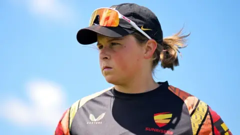 Grace Scrivens of Sunrisers looks on ahead of the Charlotte Edwards Cup match between Western Storm and Sunrisers at The Cooper Associates County Ground