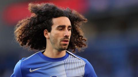Marc Cucurella warming up