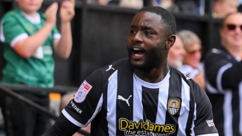 Matthew Dennis celebrates scoring for Notts County